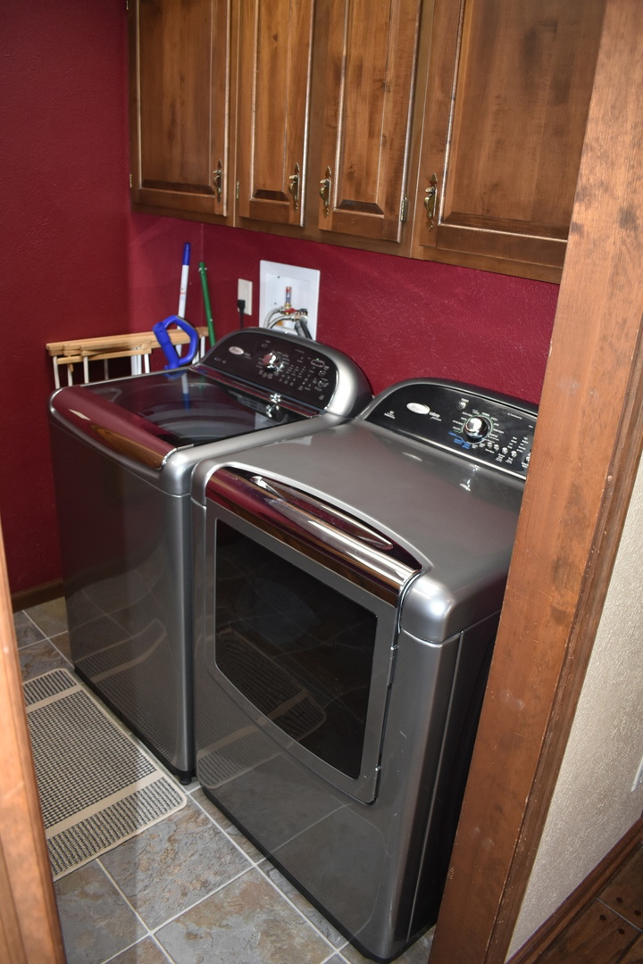 1413 East 550th Road Lostant, IL 61334 - Photo 9 of 37 a kitchen with stove and cabinets