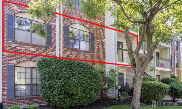 a street sign on the side of a building