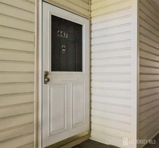 an aerial view of a house with outdoor space
