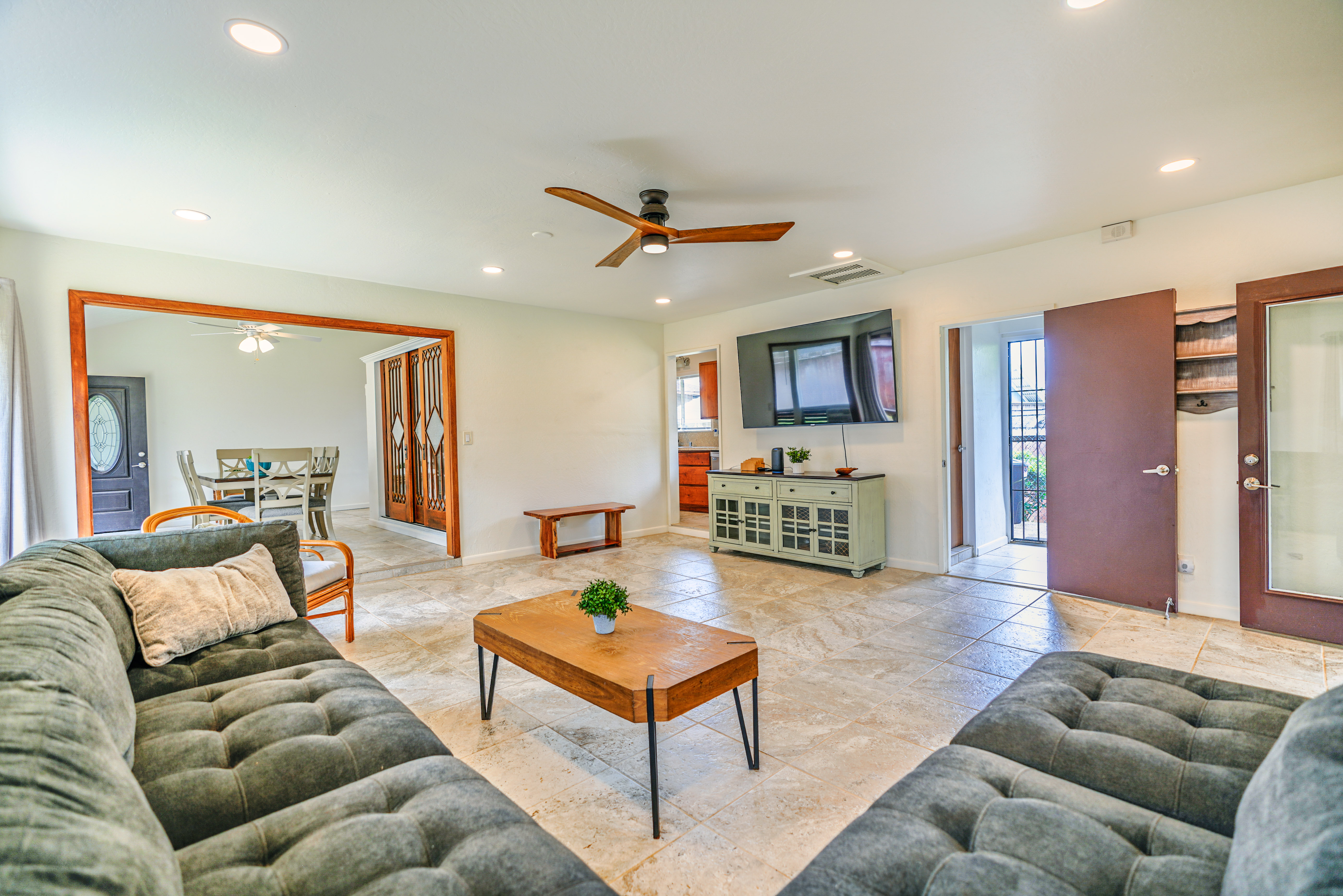 316 A Makani Road, Unit A Kapaa, HI 96746 - Photo 4 of 29 a living room with furniture a ceiling fan and a rug