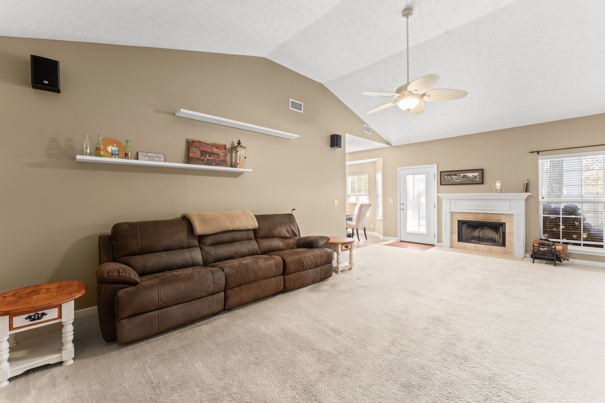 3339 Cotswold Lane Murfreesboro, TN 37128 - Photo 4 of 19 a living room with furniture a fireplace and a flat screen tv