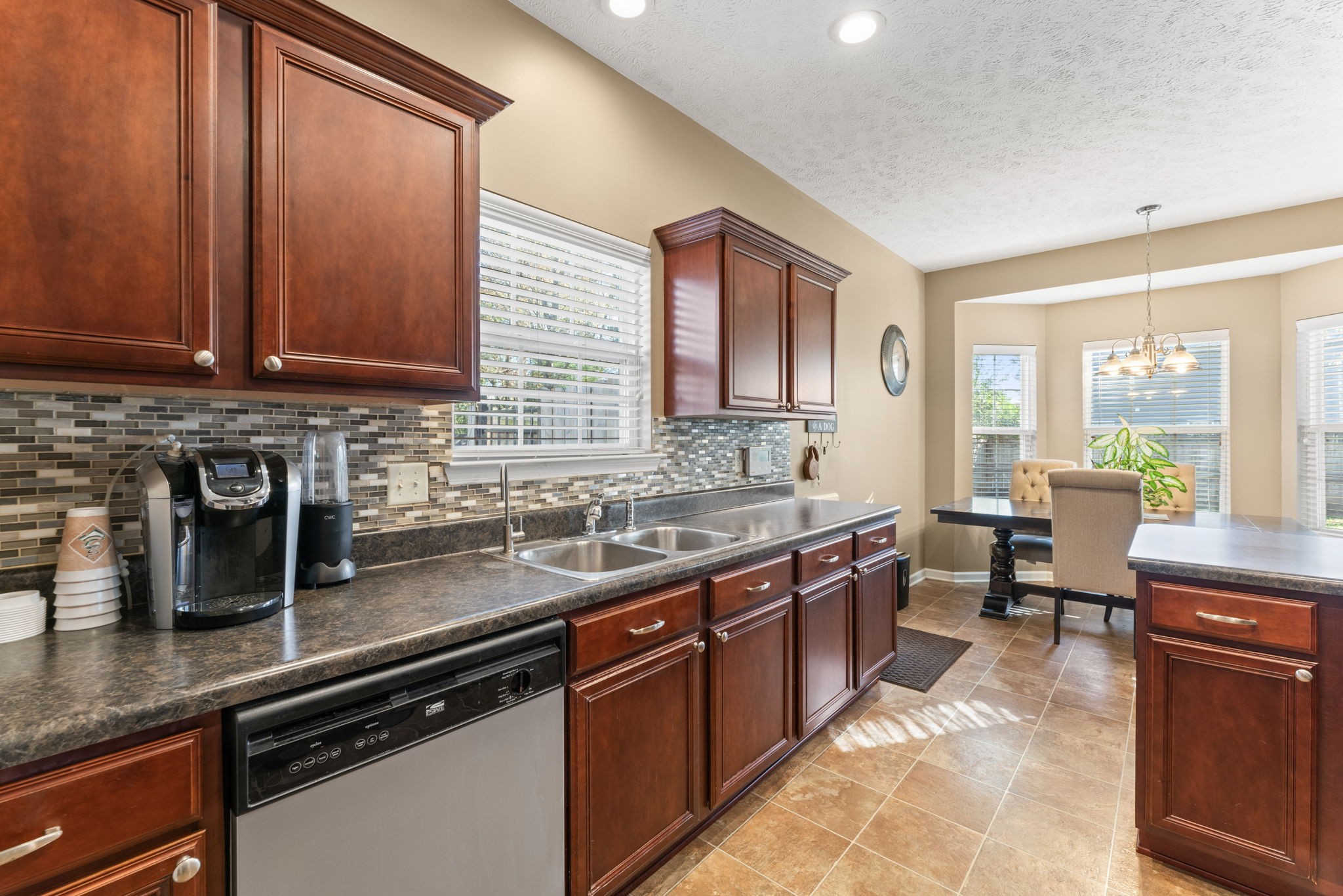 3339 Cotswold Lane Murfreesboro, TN 37128 - Photo 10 of 19 a kitchen with stainless steel appliances granite countertop a sink stove and cabinets