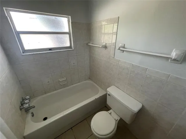 a view of livingroom with hardwood floor and window