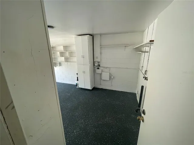 a storage room with cabinets