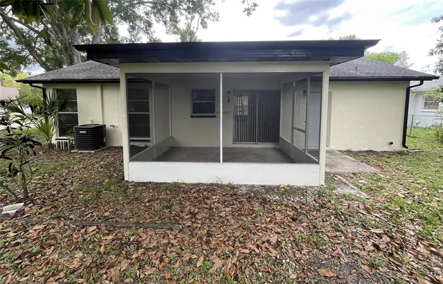a view of room with trees in the background