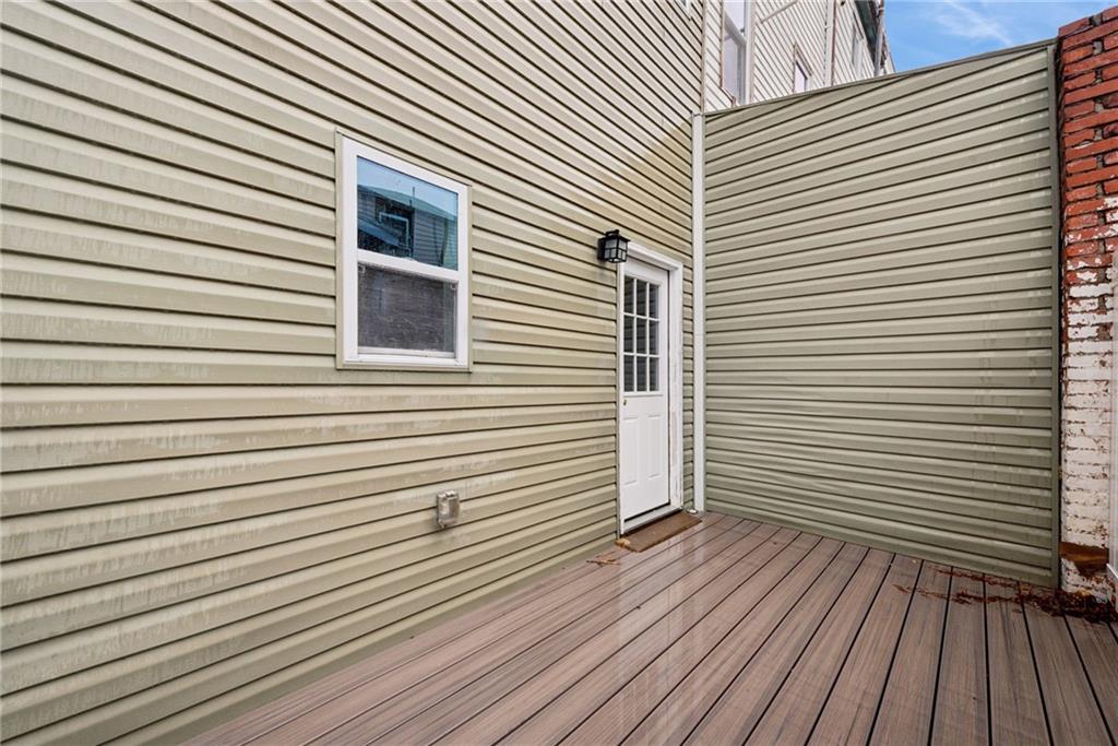 4416 Woolslayer Way Pittsburgh, PA 15224 - Photo 11 of 21 a view of a wooden deck