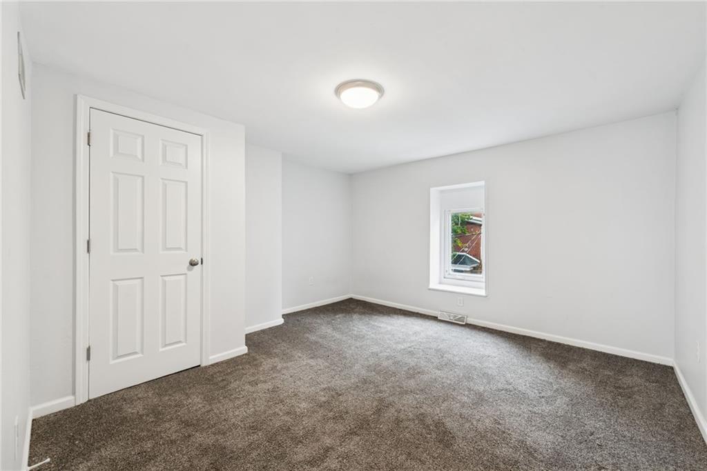 4416 Woolslayer Way Pittsburgh, PA 15224 - Photo 16 of 21 an empty room with a cabinet