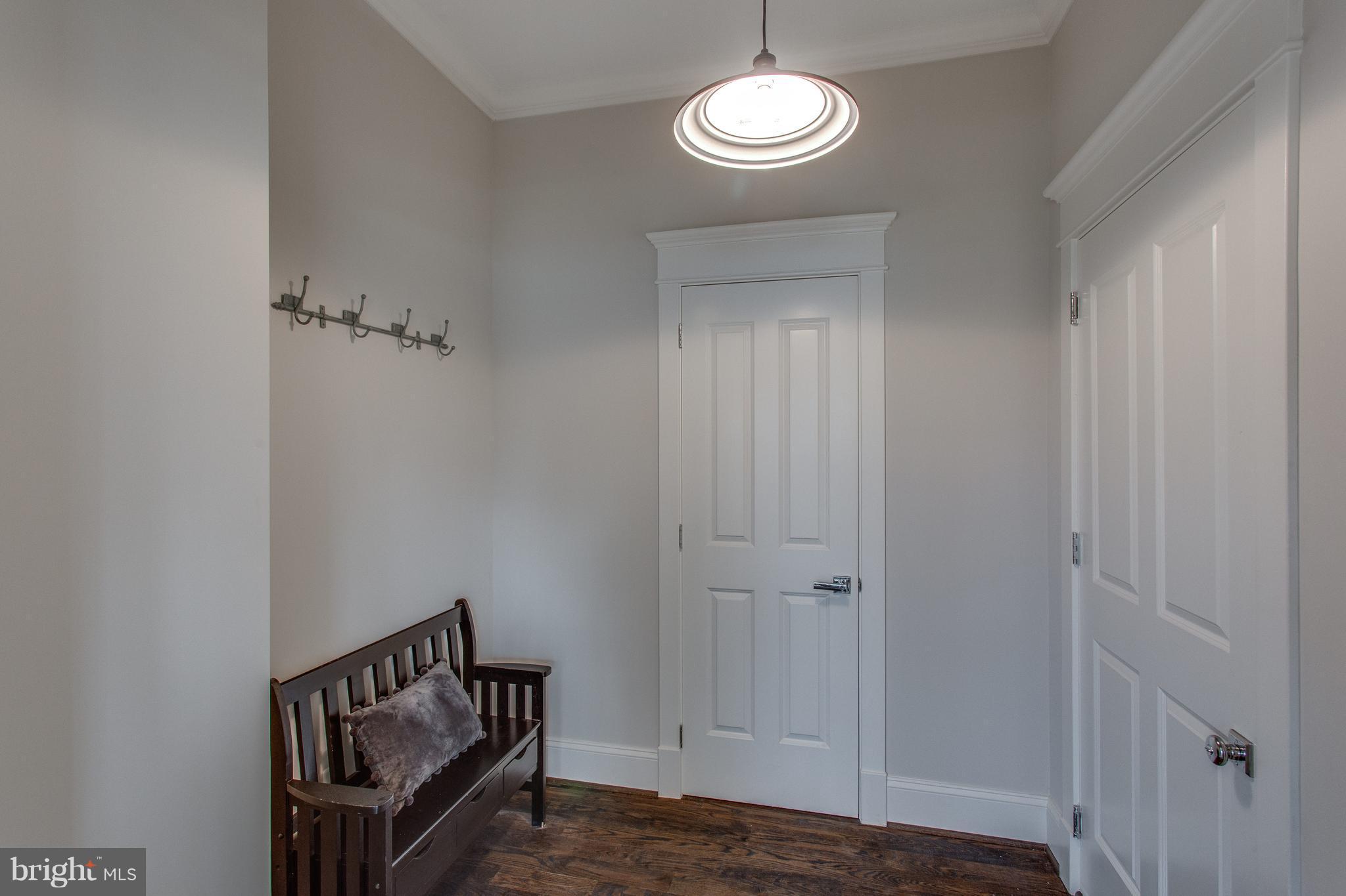 8111 Wellington Road Alexandria, VA 22308 - Photo 14 of 30 Mudroom with optional built-in cubbies at cost