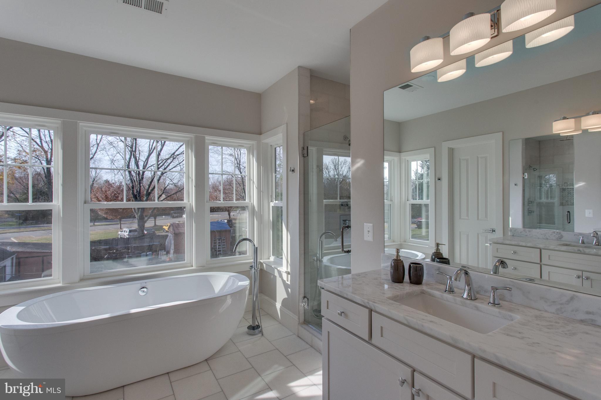 8111 Wellington Road Alexandria, VA 22308 - Photo 16 of 30 Luxurious master bath w soaking tub and sep shower