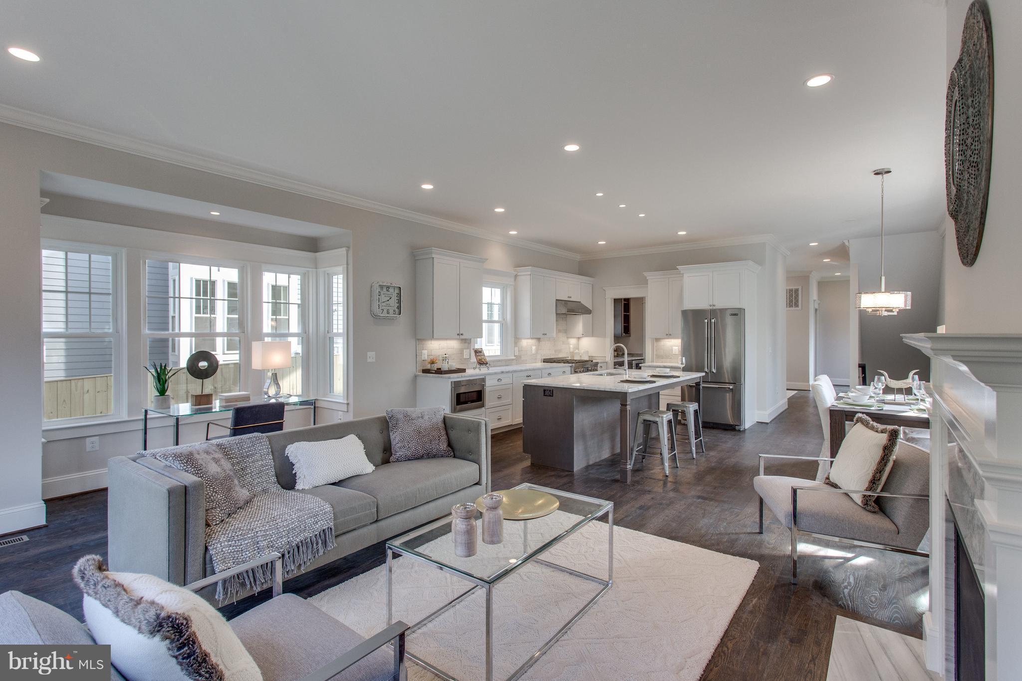 8111 Wellington Road Alexandria, VA 22308 - Photo 2 of 30 Light-filled bump-outs add depth