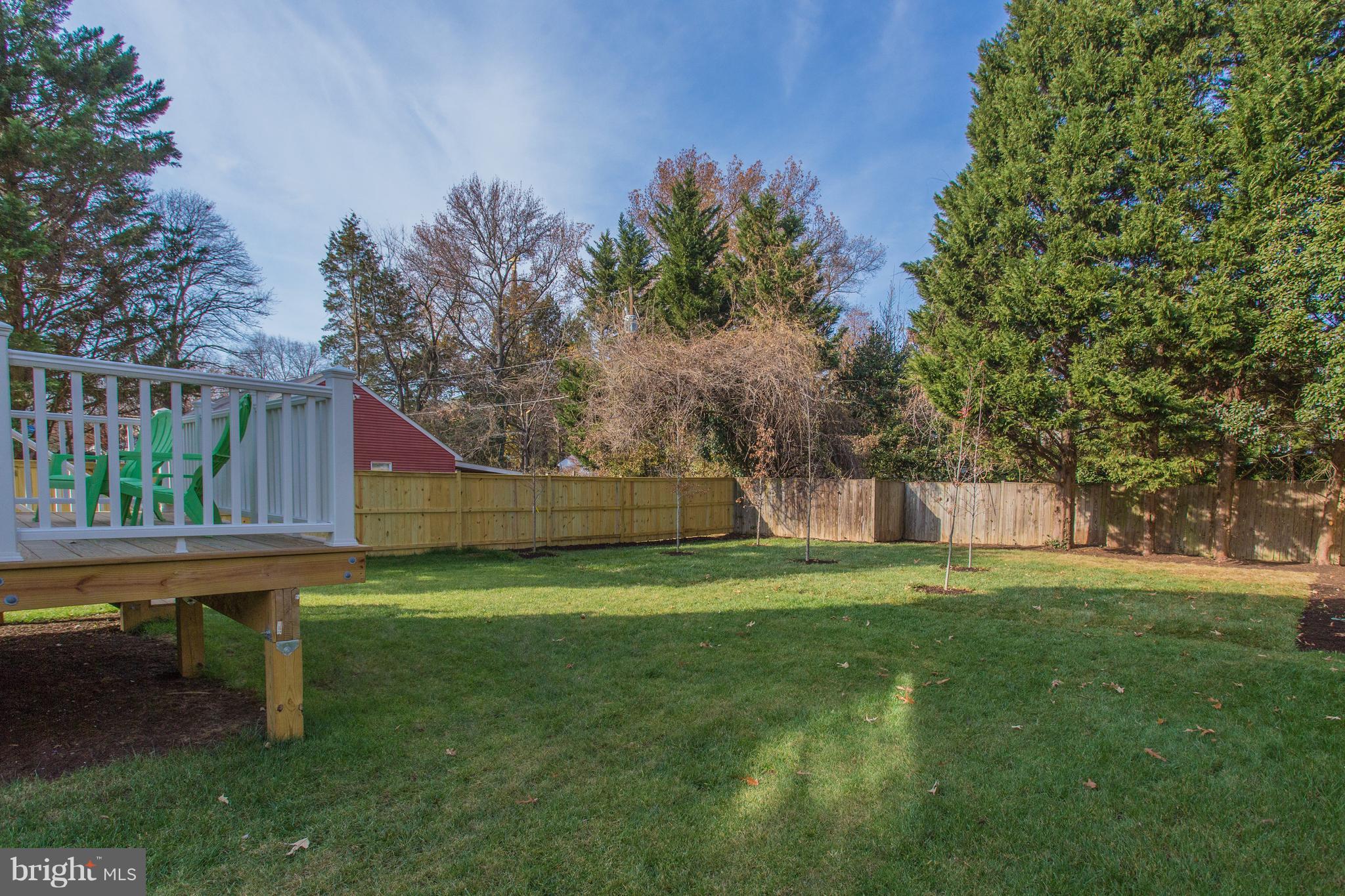 8111 Wellington Road Alexandria, VA 22308 - Photo 27 of 30 Huge fully fenced backyard with greenery