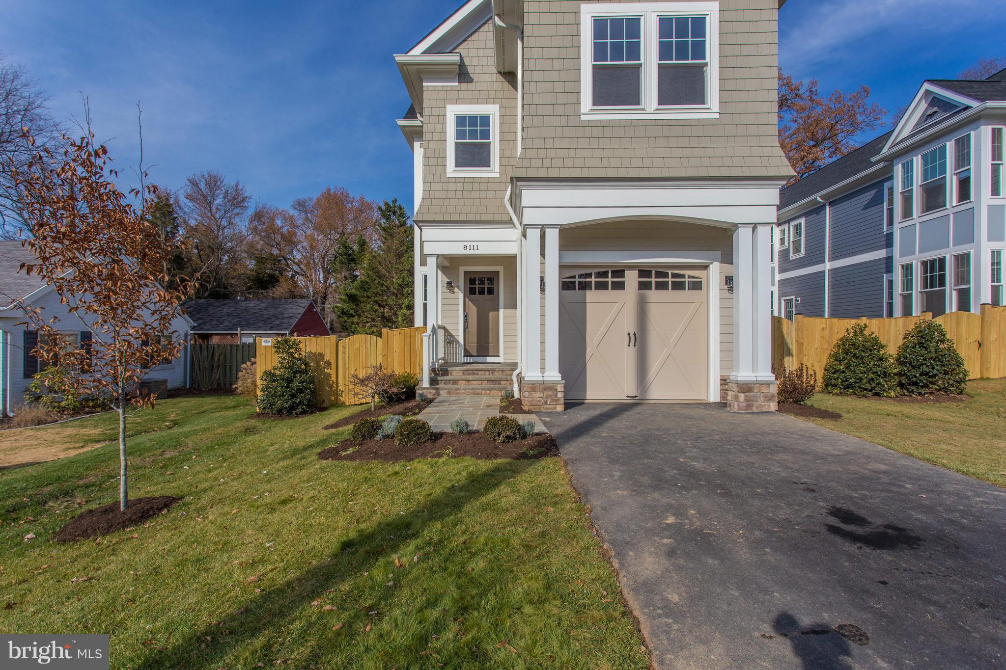 8111 Wellington Road Alexandria, VA 22308 - Photo 29 of 30 Attached 1-car garage plus driveway parking