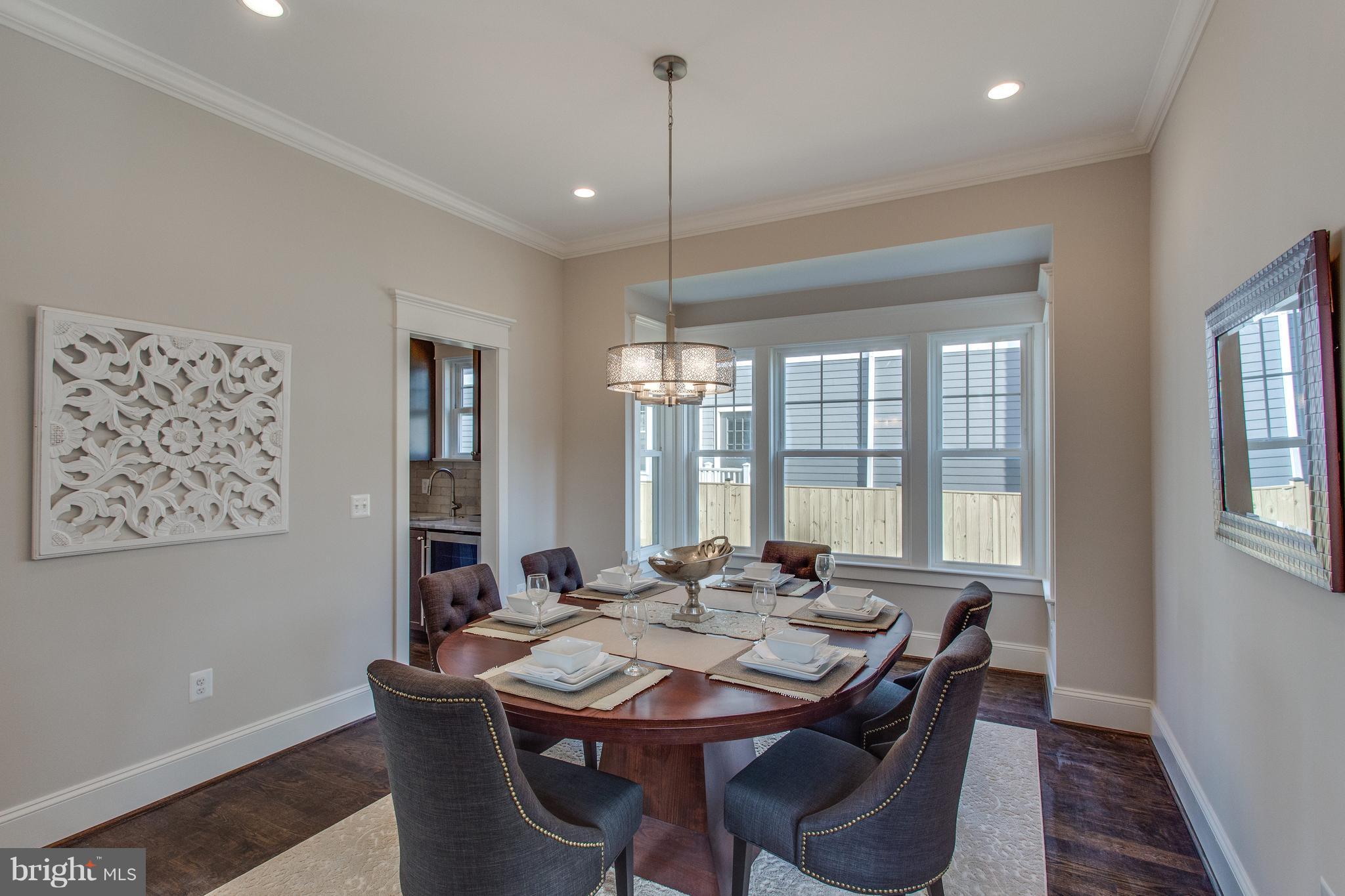 8111 Wellington Road Alexandria, VA 22308 - Photo 3 of 30 Formal dining room with attached wet bar