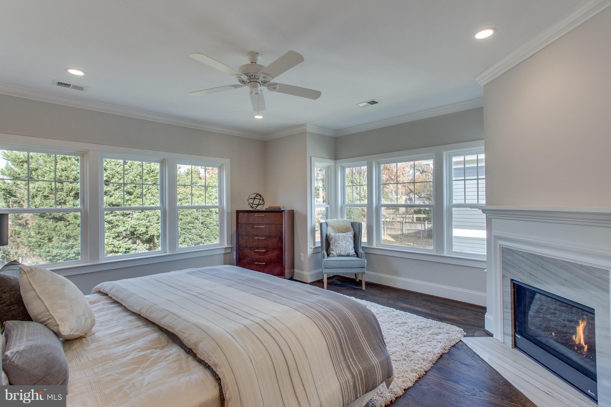 8111 Wellington Road Alexandria, VA 22308 - Photo 4 of 30 Gas fireplace in MBR is perfect for wintry nights