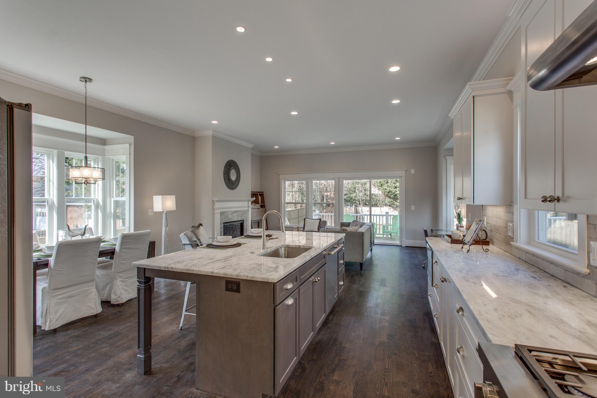 8111 Wellington Road Alexandria, VA 22308 - Photo 9 of 30 A spacious central gathering place