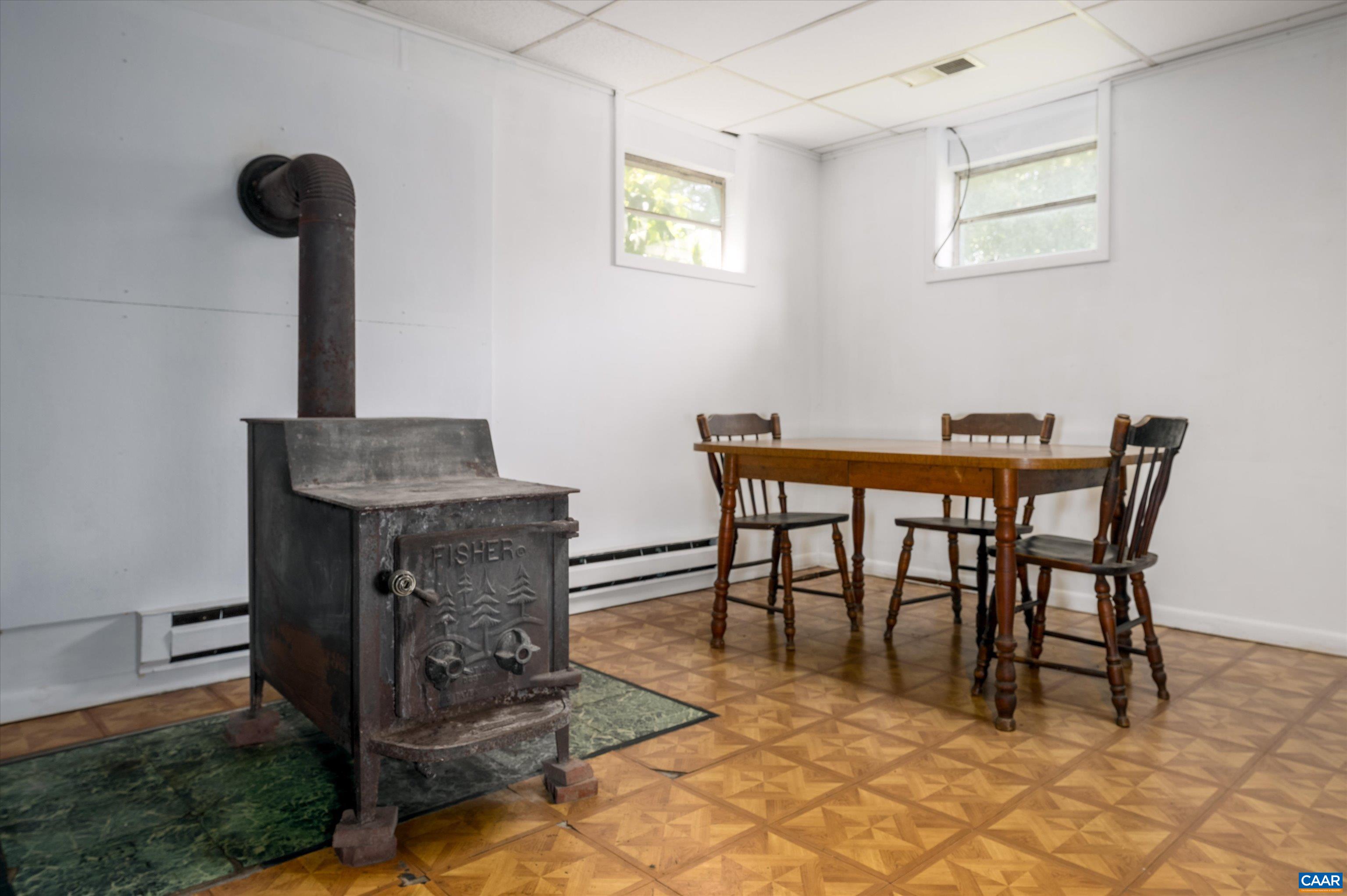 579 Miller Mountain Road Stanardsville, VA 22973 - Photo 18 of 27 a dining room with furniture and a table