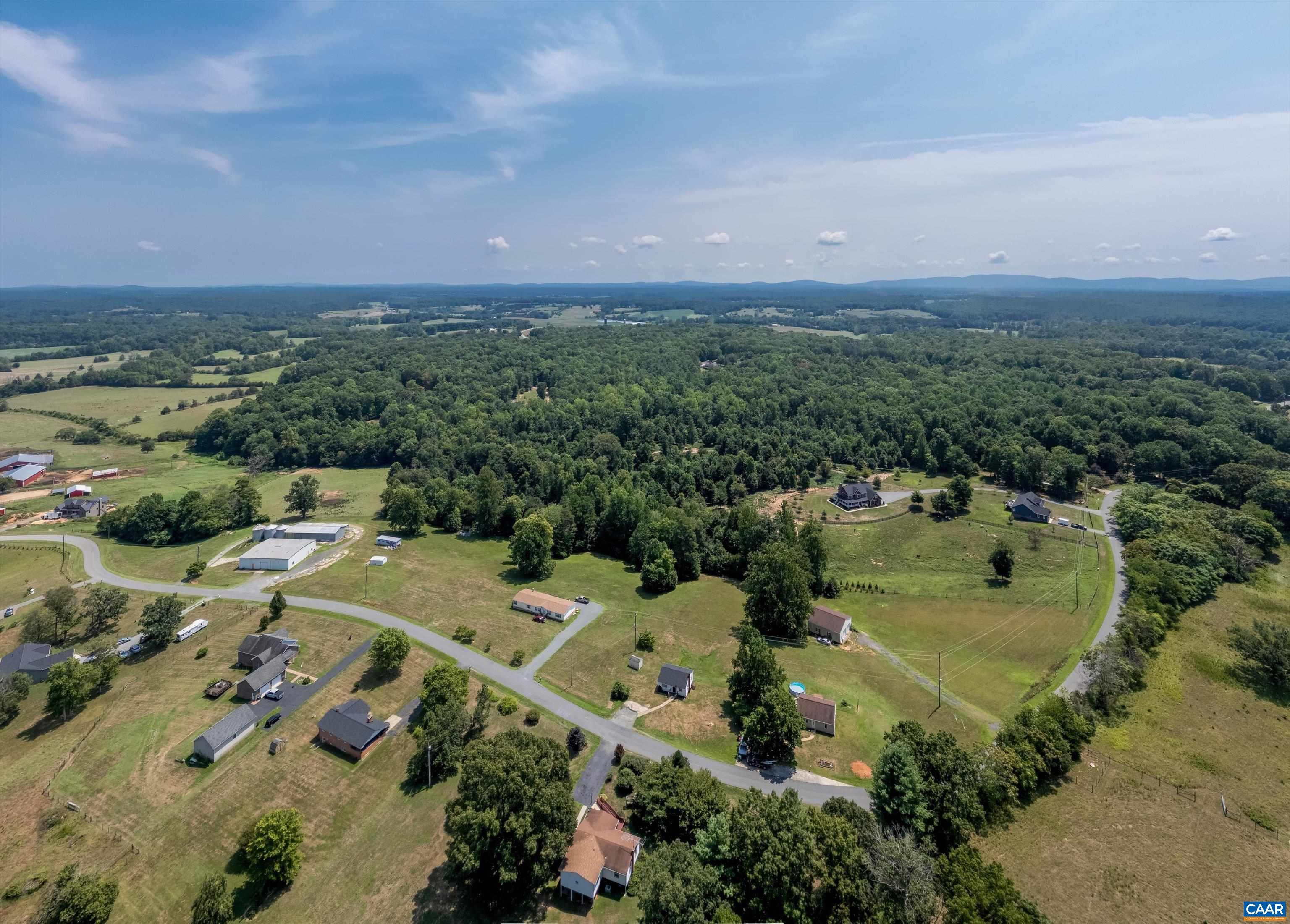 579 Miller Mountain Road Stanardsville, VA 22973 - Photo 23 of 27 an aerial view of a house with a yard
