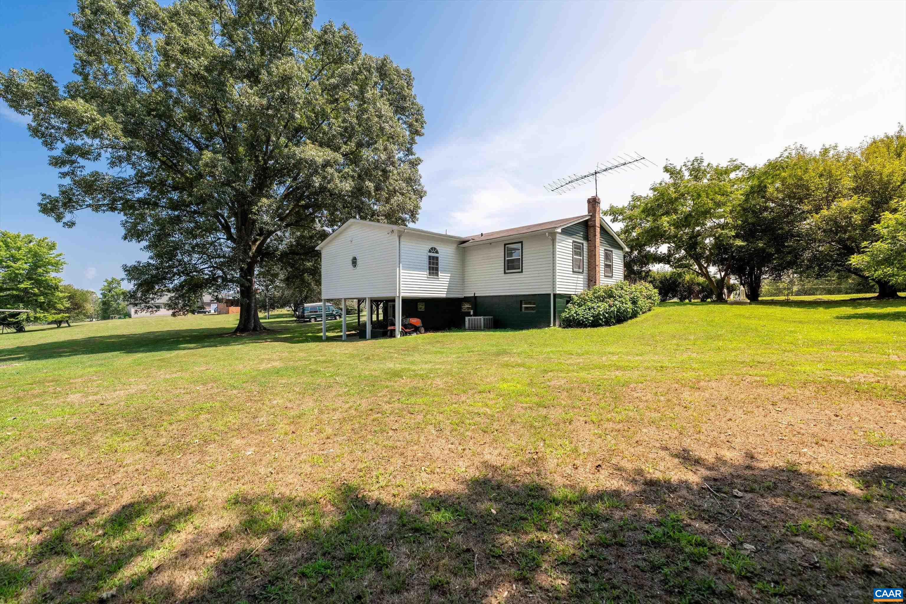 579 Miller Mountain Road Stanardsville, VA 22973 - Photo 27 of 27 a view of a house with a yard