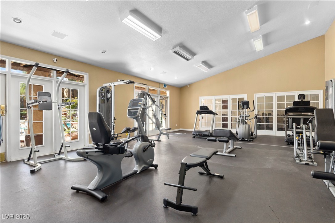 9325 West Desert Inn Road, Unit 141 Las Vegas, NV 89117 - Photo 26 of 30 Gym featuring vaulted ceiling