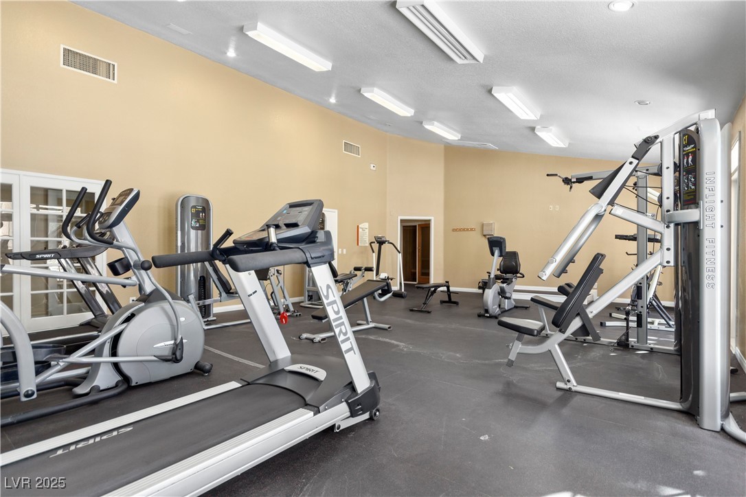 9325 West Desert Inn Road, Unit 141 Las Vegas, NV 89117 - Photo 27 of 30 Gym with a textured ceiling