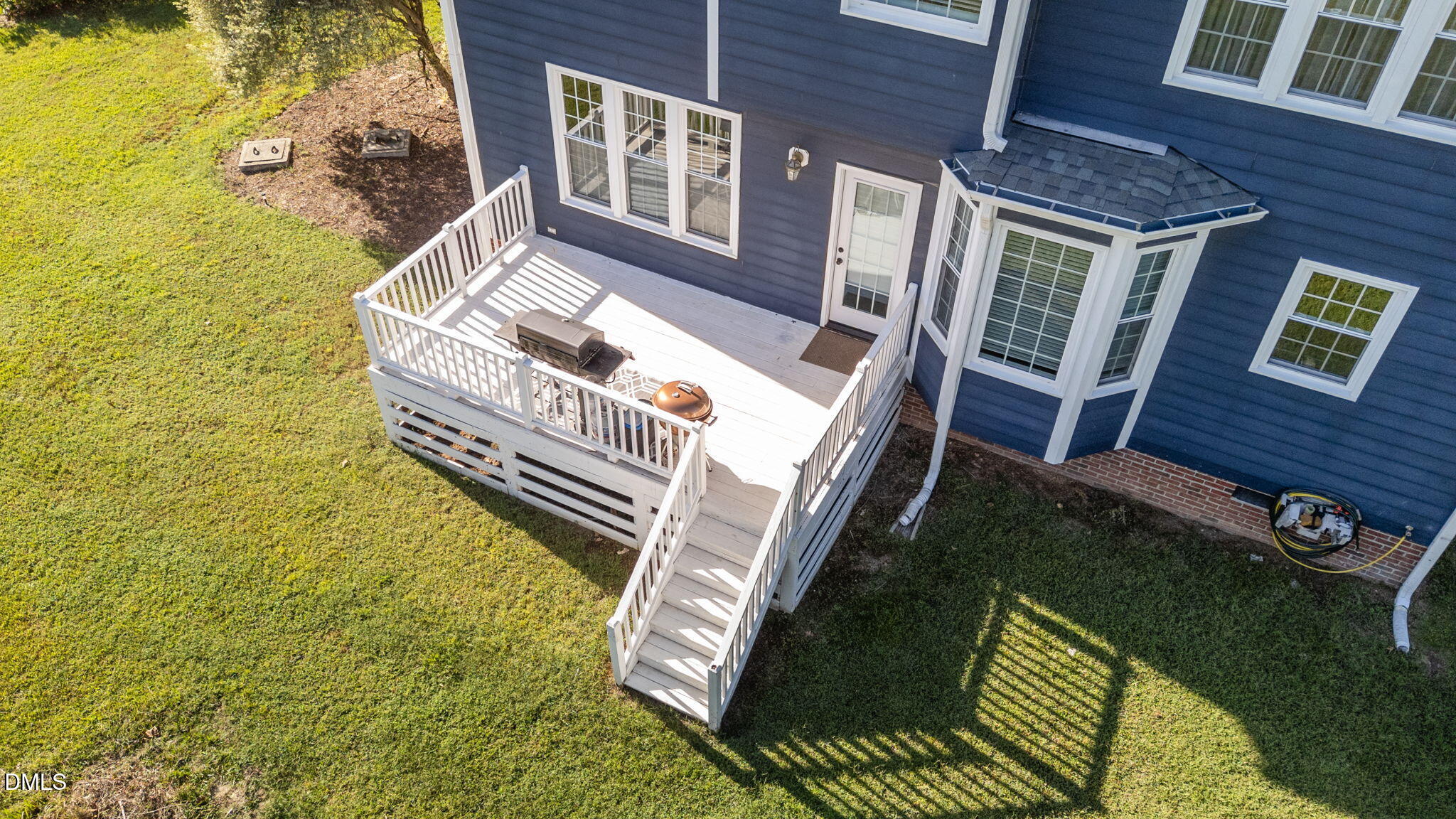 1617 Kendall Hill Road Willow Spring, NC 27592 - Photo 22 of 58 a view of an chairs in the balcony