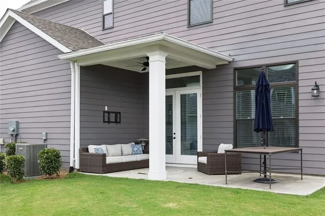 a view of house with backyard space and garden