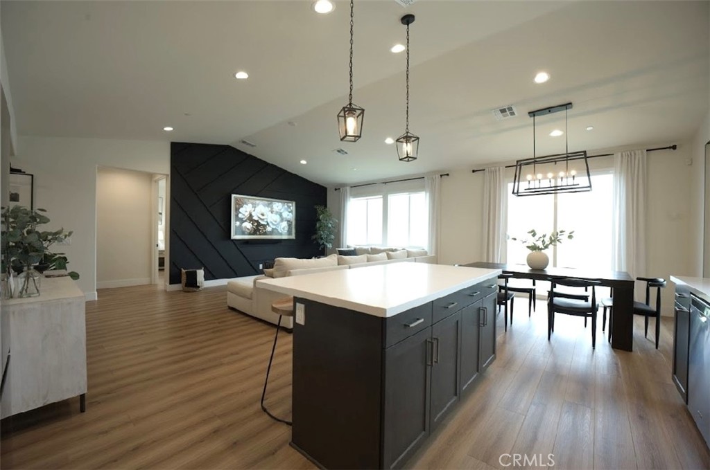 14159 Eclipse Street Moreno Valley, CA 92555 - Photo 14 of 27 a kitchen with a table and chairs in it