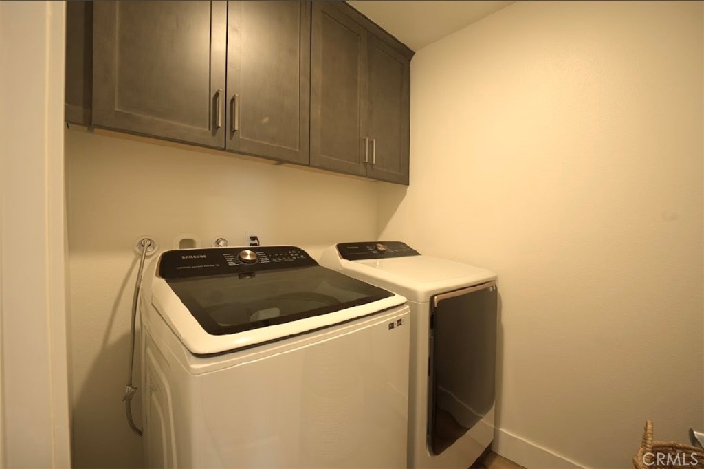 14159 Eclipse Street Moreno Valley, CA 92555 - Photo 22 of 27 a utility room with dryer and washer