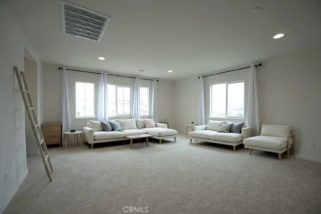 14159 Eclipse Street Moreno Valley, CA 92555 - Photo 23 of 27 a living room with furniture and a window