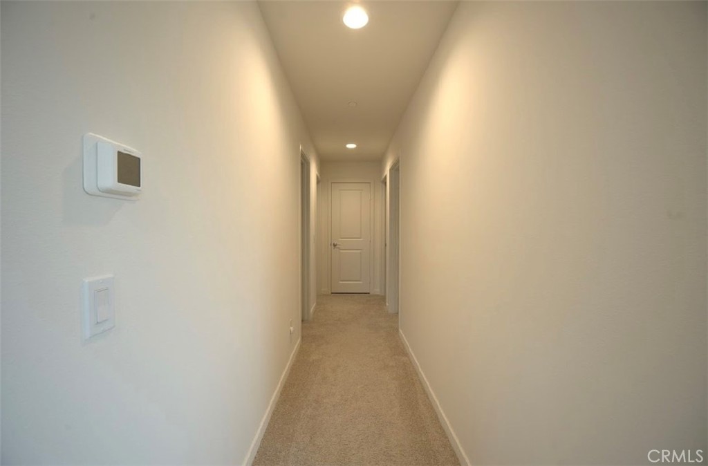 14159 Eclipse Street Moreno Valley, CA 92555 - Photo 24 of 27 a view of a hallway