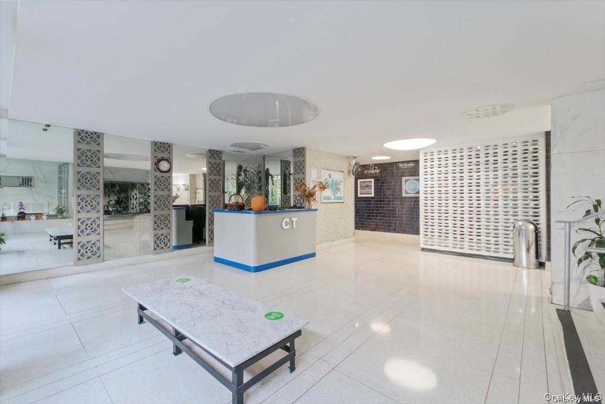 43-10 Kissena Boulevard, Unit 2B Queens, NY 11355 - Photo 18 of 23 a living room with furniture and view of kitchen