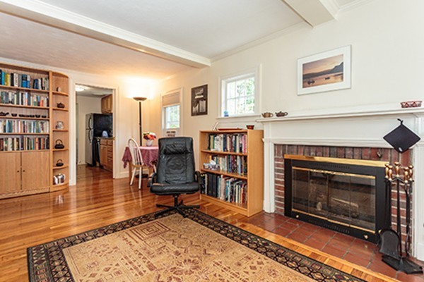 46 Lansdowne Road Arlington, MA 02474 - Photo 2 of 29 a living room with furniture and a fireplace