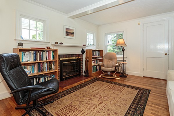 46 Lansdowne Road Arlington, MA 02474 - Photo 3 of 29 a workspace with furniture bookshelf and a window
