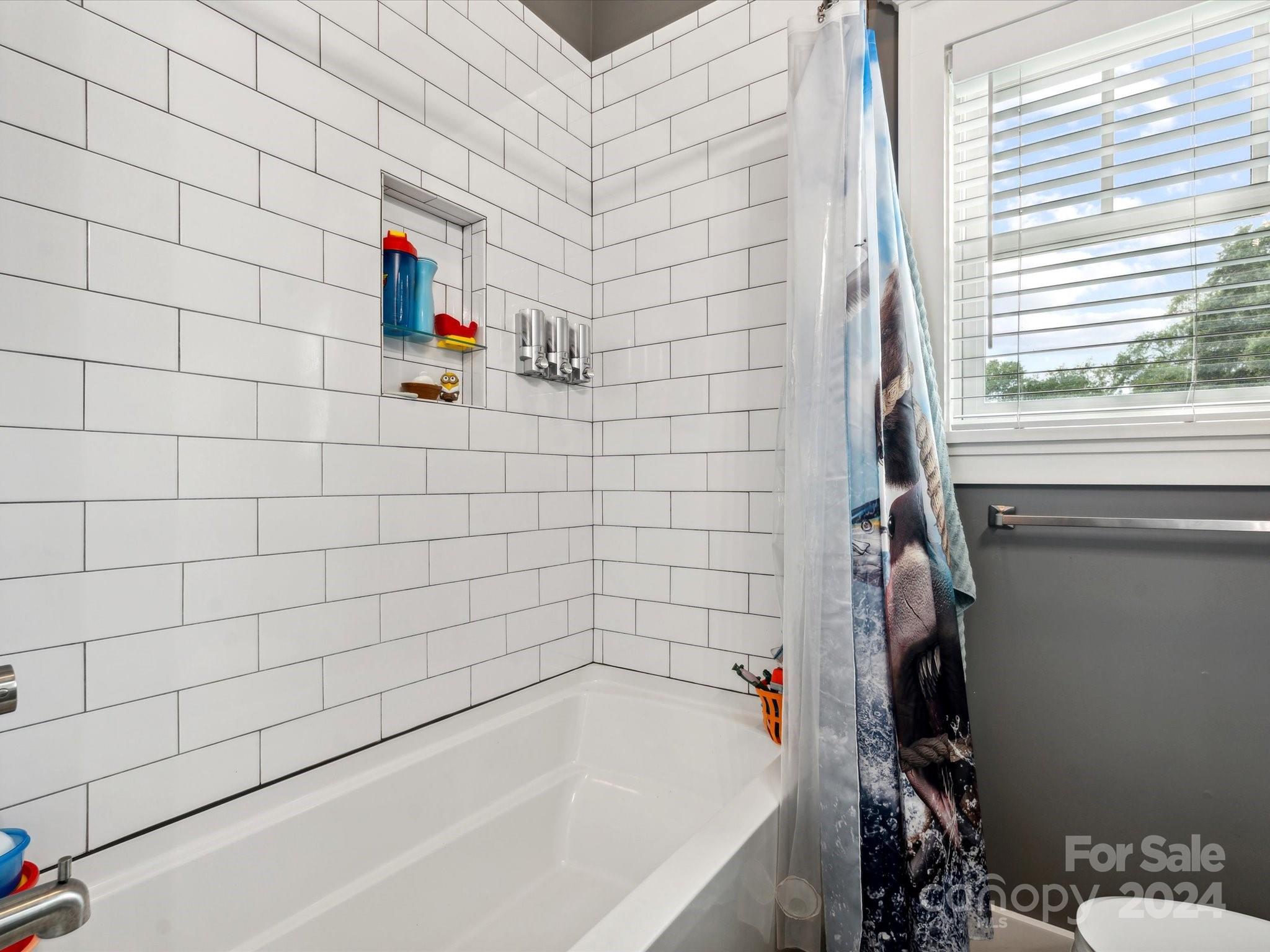 1156 Williams Road Fort Mill, SC 29715 - Photo 11 of 44 a bathroom with a bathtub