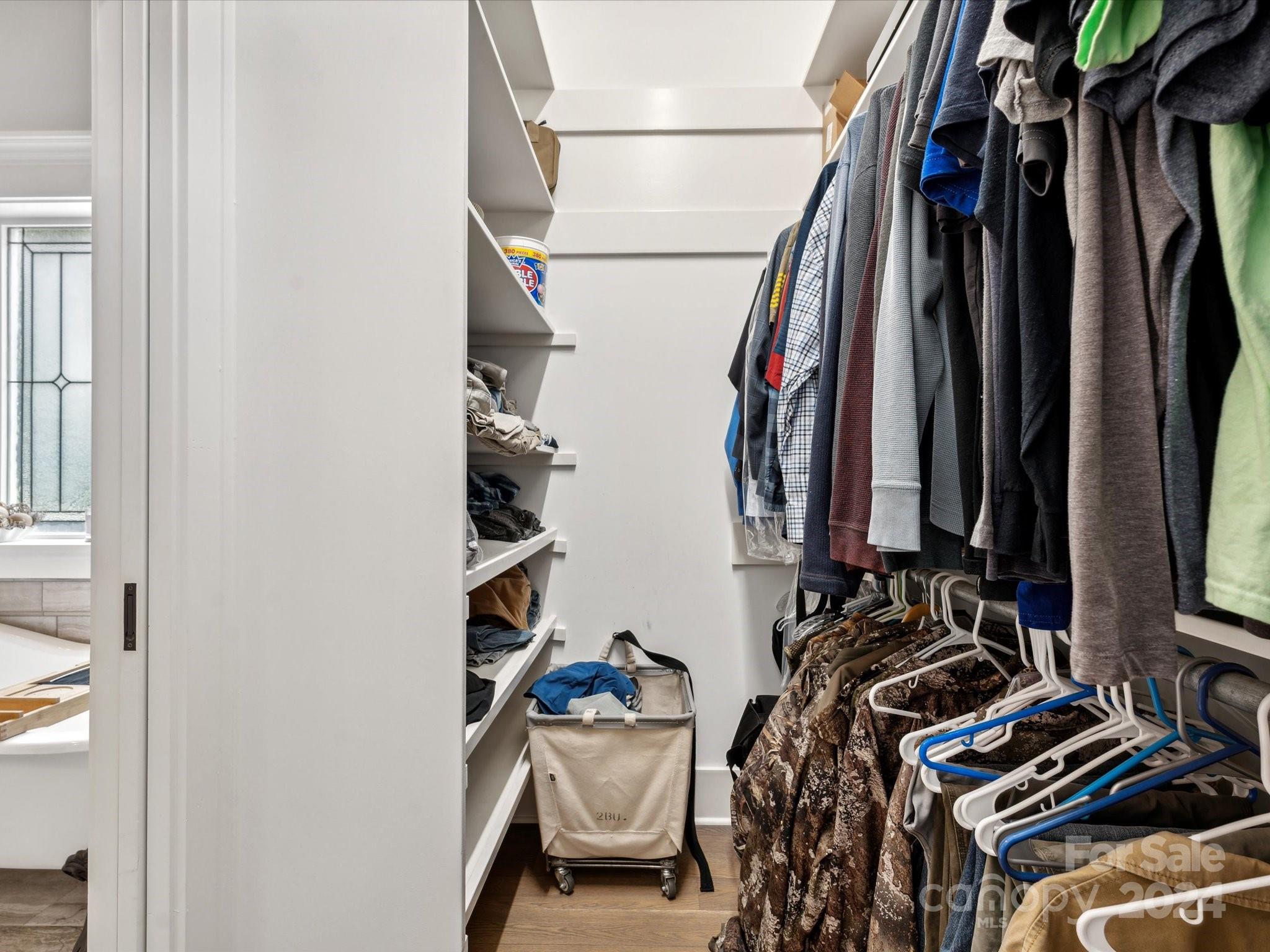 1156 Williams Road Fort Mill, SC 29715 - Photo 24 of 44 a view of walk in closet with clothes and shoes