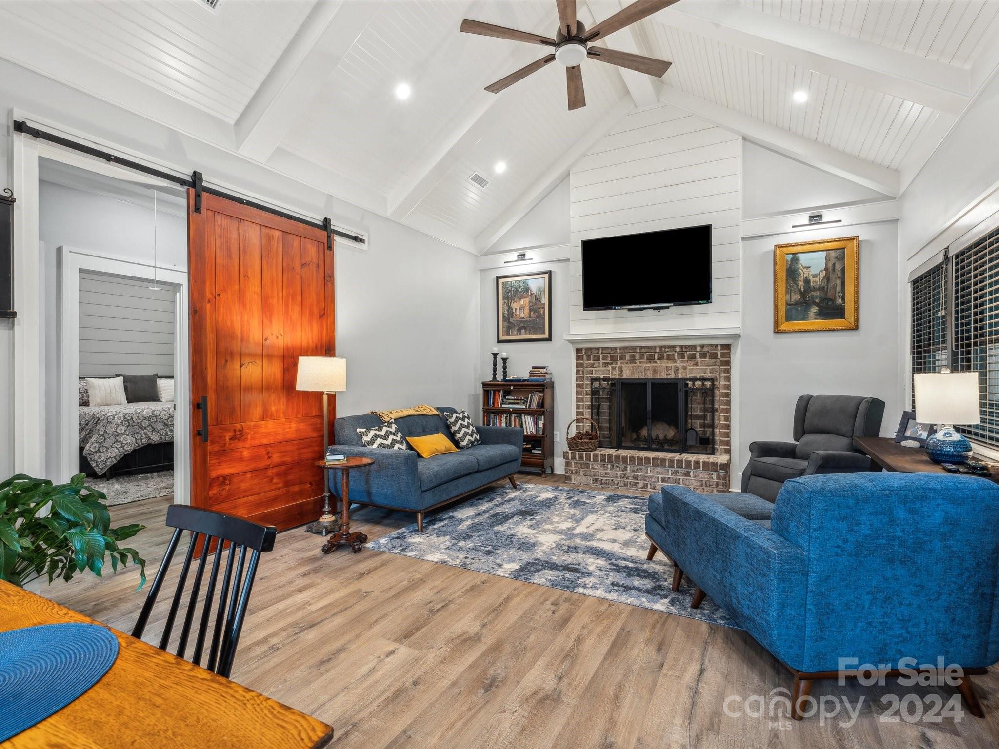 1156 Williams Road Fort Mill, SC 29715 - Photo 35 of 44 a living room with furniture fireplace and flat screen tv