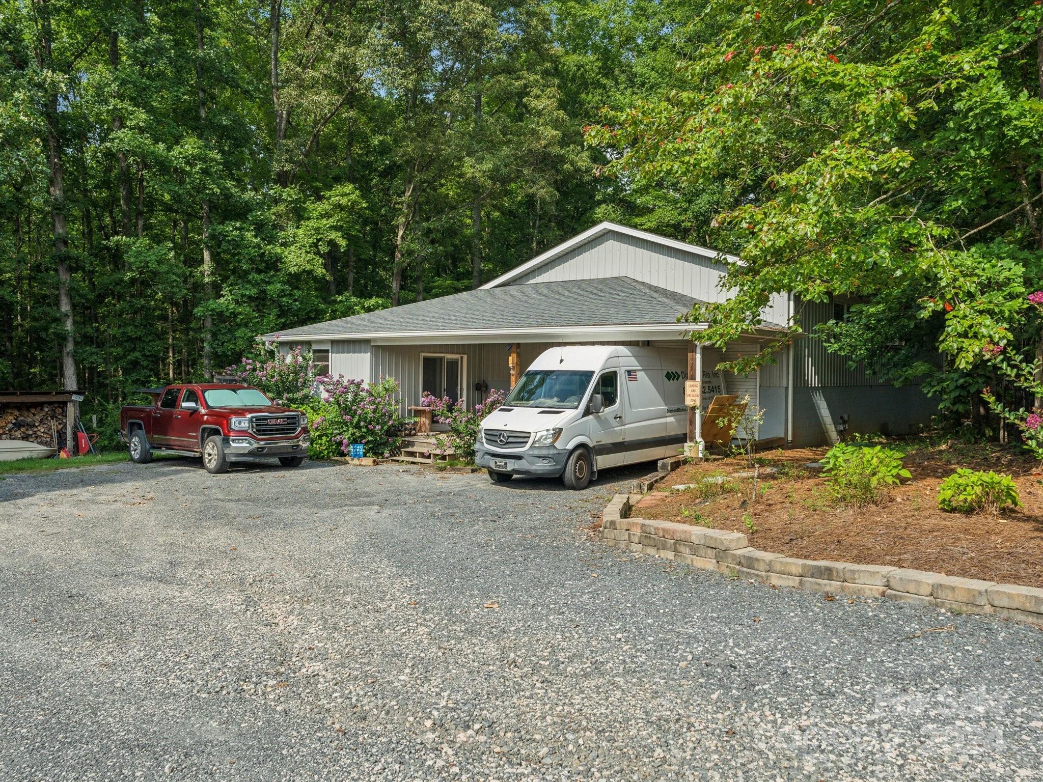 1156 Williams Road Fort Mill, SC 29715 - Photo 40 of 44 a car parked in front of house with a yard