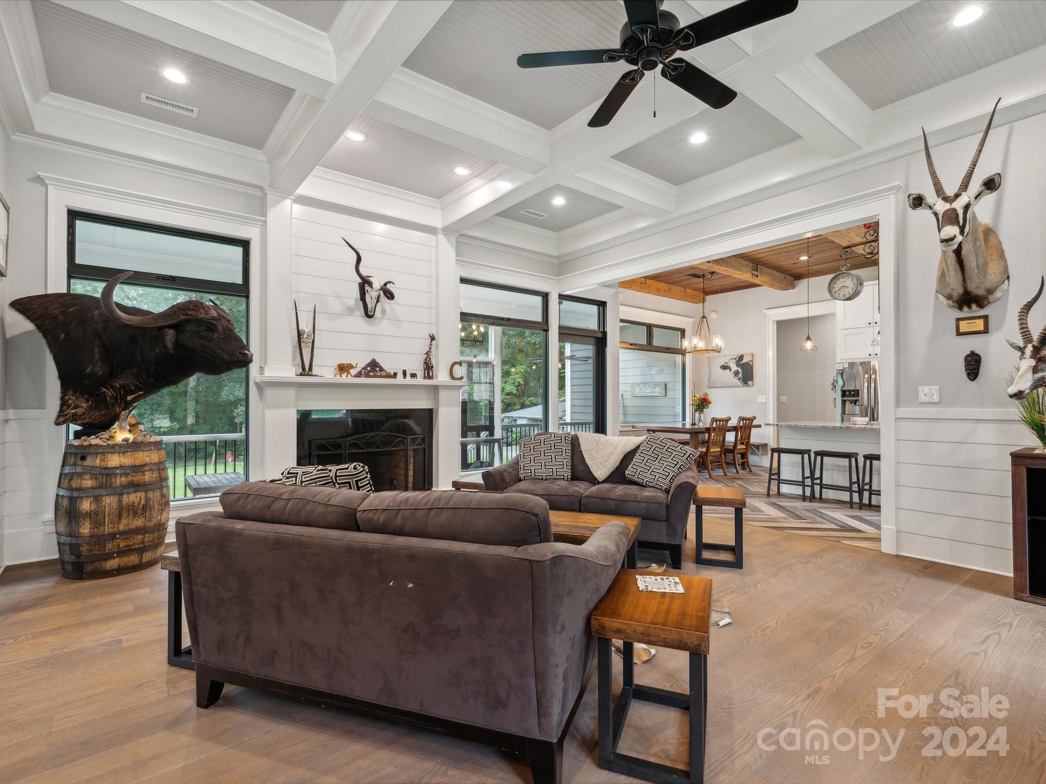 1156 Williams Road Fort Mill, SC 29715 - Photo 5 of 44 a living room with furniture a fireplace and a flat screen tv