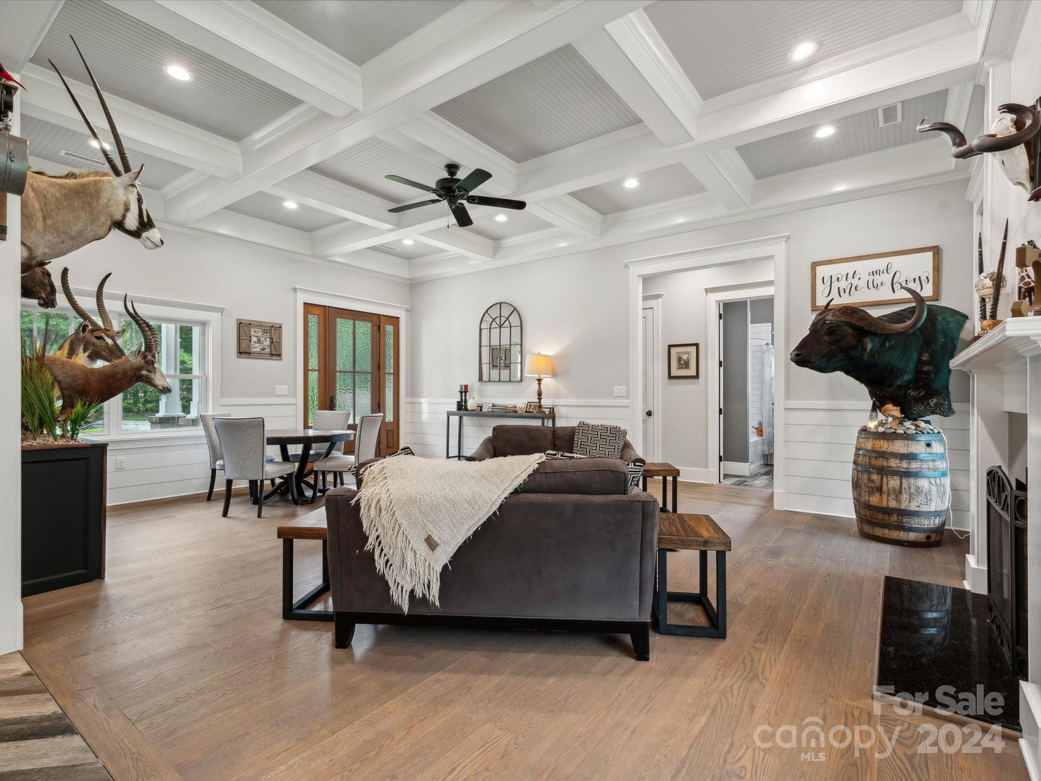 1156 Williams Road Fort Mill, SC 29715 - Photo 7 of 44 a living room with furniture and a chandelier