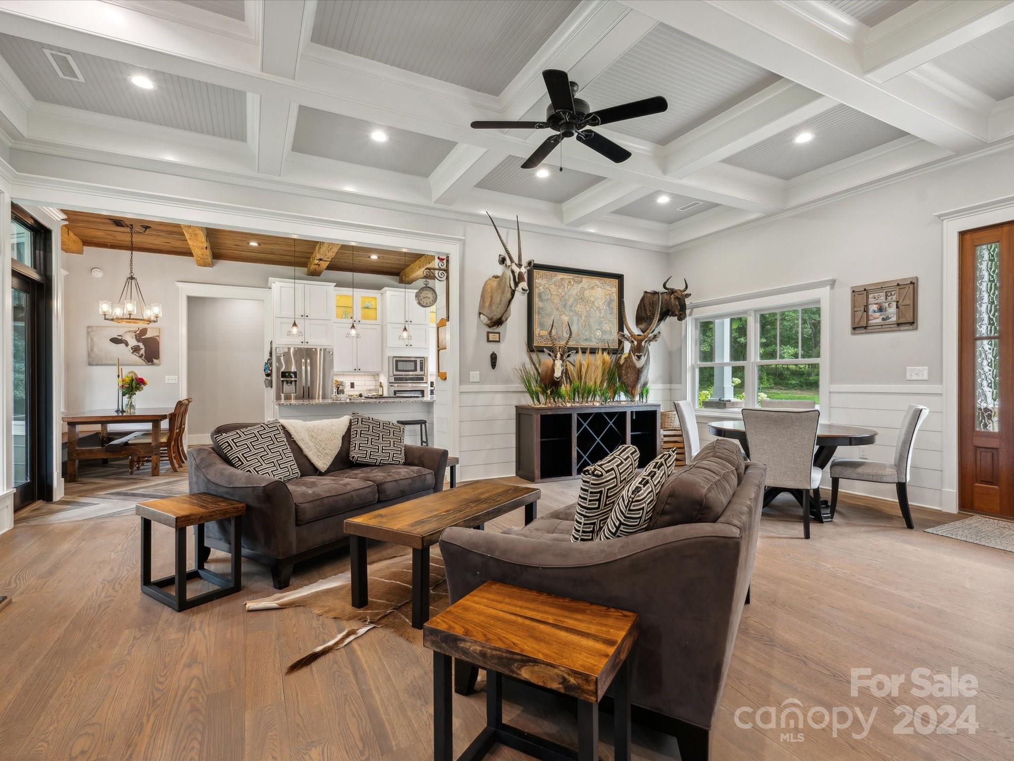 1156 Williams Road Fort Mill, SC 29715 - Photo 8 of 44 a living room with furniture a fireplace and a large window