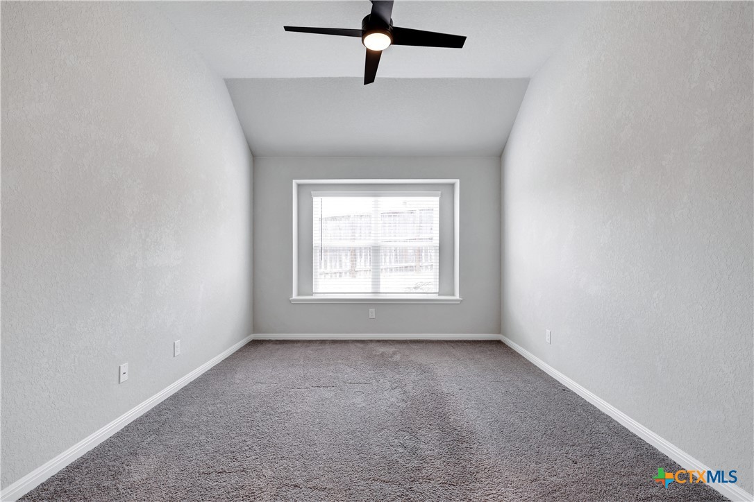 32144 Cardamom Way Bulverde, TX 78163 - Photo 19 of 30 a view of room with window and ceiling fan