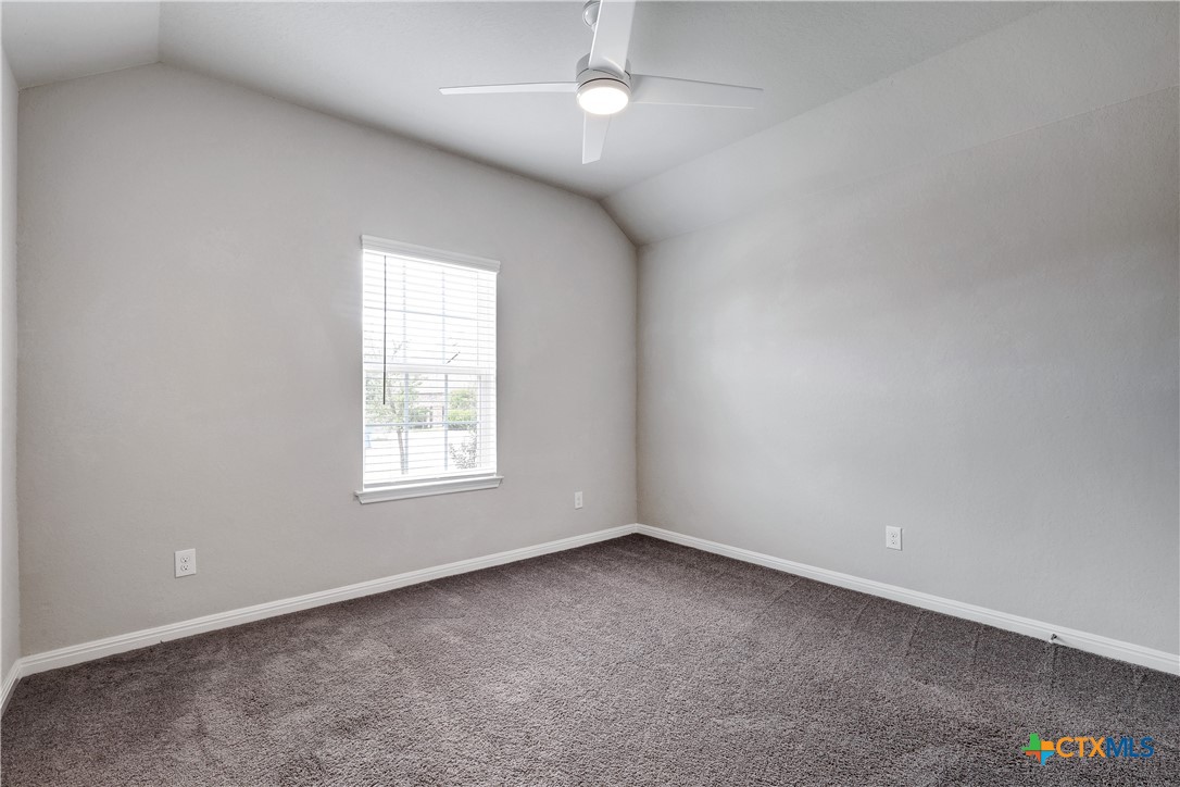 32144 Cardamom Way Bulverde, TX 78163 - Photo 24 of 30 an empty room with a window
