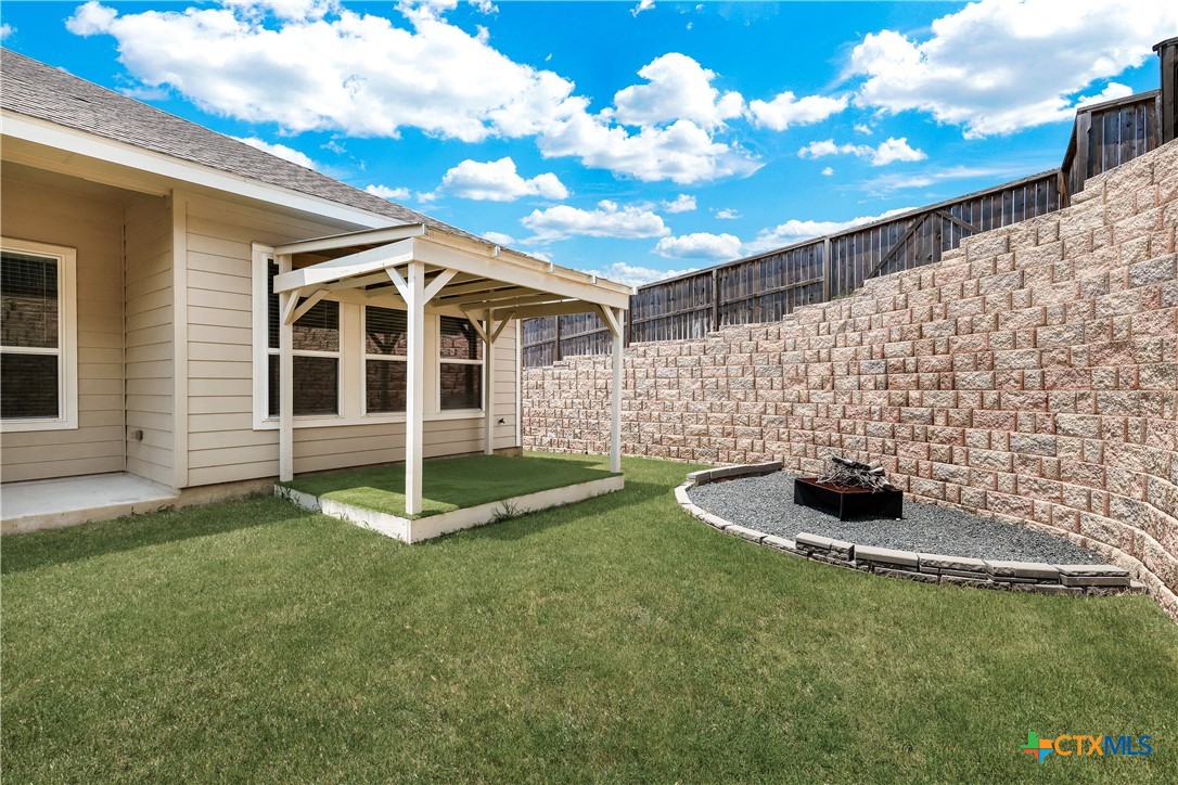 32144 Cardamom Way Bulverde, TX 78163 - Photo 28 of 30 a front view of a house with a garden