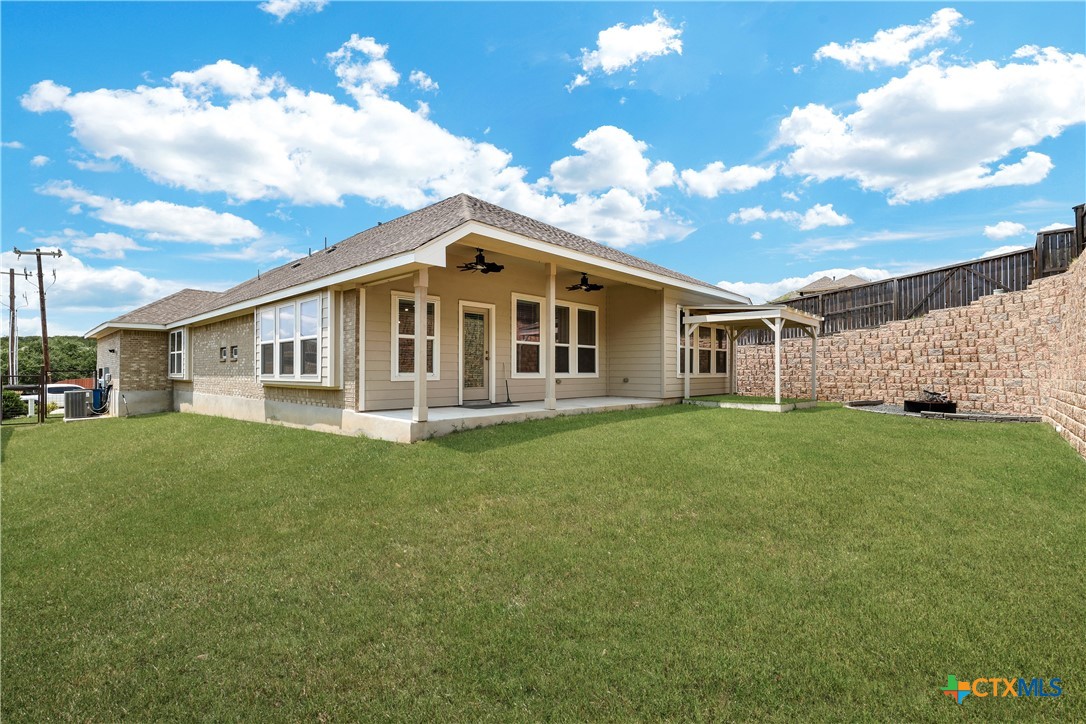 32144 Cardamom Way Bulverde, TX 78163 - Photo 30 of 30 a front view of a house with a garden