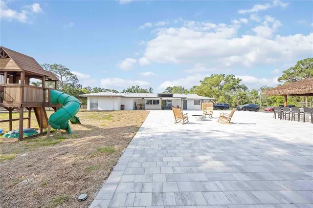 a view of a house with entertaining space
