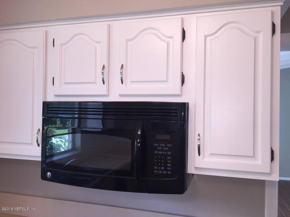 5107 Spring Glen Road Jacksonville, FL 32207 - Photo 13 of 16 a close view of fireplace