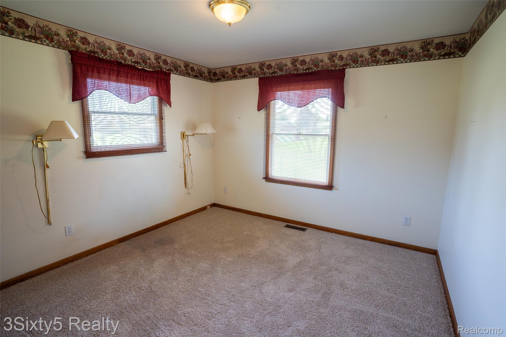 1783 Farnsworth Road Lapeer, MI 48446 - Photo 22 of 51 Carpeted empty room featuring baseboards