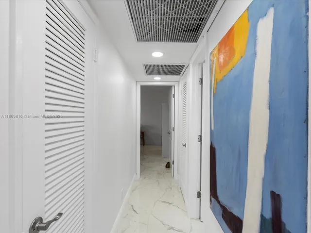 a view of hallway with shower