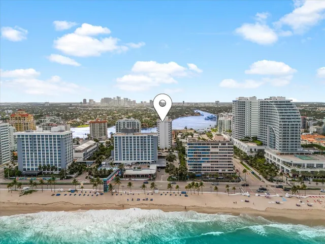 a view of a lake with a yard