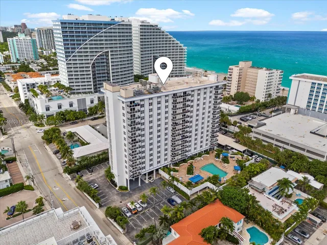 a view of a city with tall buildings